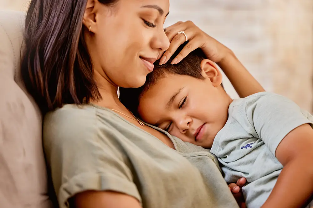 mom embracing son